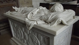 Grave statue of figure sleeping